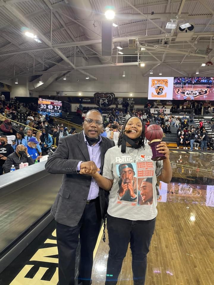 Celebrating a player’s award on the college hardwood